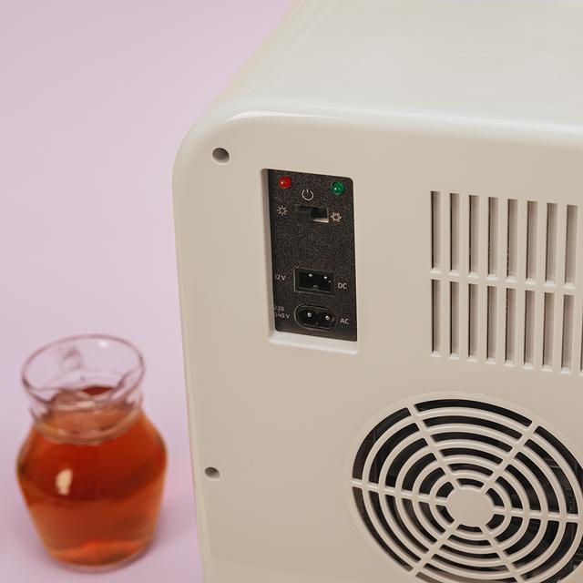 Bolero MiniCooling 20L Bahamas Pink Frigorífico con funcionamiento 12V-220V, compatible con coches y caravanas, función enfriamiento y calentamiento, rango temperatura de 7 a 65 ºC y transporte fácil.